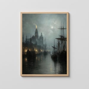May include: A framed, vintage-style painting of a harbor scene at night. The artwork depicts tall ships, a city skyline, and a full moon in a moody, atmospheric style. The painting is set in a wooden frame.