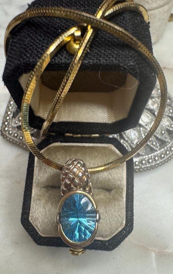 Gold & Silver Blue Topaz Pendant