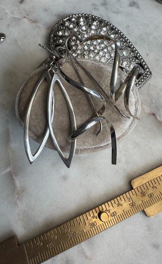 Silver Pair of Modern Design Earrings