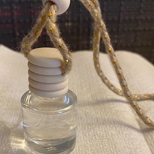 Car diffusers, favorite scent on the go, fragrance oils, odor control in car, Hang your new car accessory on your Rearview mirror