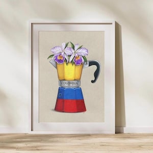 May include: A framed art print featuring a colorful illustration of a coffee maker. The coffee maker is yellow, blue, and red, with the word "COLOMBIA" on it. The coffee maker is filled with purple and white flowers.