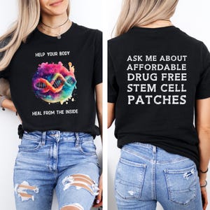 May include: Black t-shirt with the text "HELP YOUR BODY" and "HEAL FROM THE INSIDE" on the front, along with a colorful DNA graphic. The back of the shirt reads "ASK ME ABOUT AFFORDABLE DRUG FREE STEM CELL PATCHES."