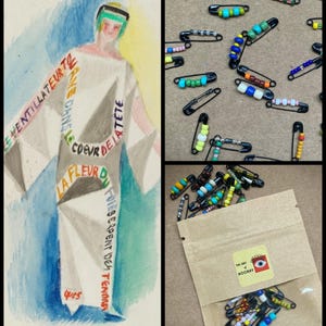 Puede incluir: Un collage con una ilustración en acuarela y alfileres de seguridad con cuentas. La ilustración representa una figura con una prenda blanca con texto en francés. Se muestran alfileres de seguridad dispersos con cuentas de colores, junto con un paquete de alfileres.