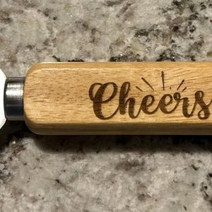 Cheers Wooden Bottle Opener, Bottle Opener, Wood and Stainless-Steel Bottle Opener.  Makes a great gift idea!