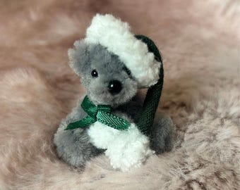 Tiny handmade teddy 1.5 sitting wearing cute Christmas hat. Cute gift, stocking filler