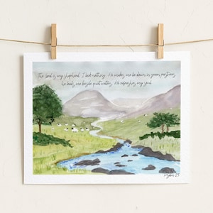 May include: A watercolour print featuring a landscape with green hills, a blue stream, and sheep. The text reads: The Lord is my shepherd. I lack nothing. He makes me lie down in green pastures. He leads me beside quiet waters. He refreshes my soul. Psalm 23.