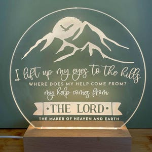 May include: A white acrylic night light with a mountain scene and the text "I lift up my eyes to the hills, where does my help come from? My help comes from THE LORD, the maker of heaven and earth".