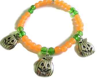 Halloween bracelet, pumpkin charm bracelet, stretch bracelet, gift for her, halloween party bracelet, green and orange bead bracelet