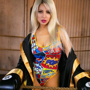 Sugarpuss POP ART ONEPIECE Bodysuit, High Cut Suit with Thong Back in Comic Book Print with Yellow Trim, Retro 80s, Cosplay Costume