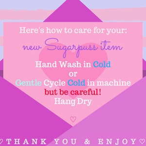 May include: Pink envelope with a handwritten note inside that says "Here's how to care for your: new Sugarpuss item Hand Wash in Cold or Gentle Cycle Cold in machine but be careful! Hang Dry" and "THANK YOU & ENJOY♡" at the bottom.
