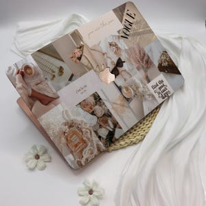 May include: A laptop with a collage of images on the cover. The images include flowers, a cup of coffee, a book, a magazine, and a quote that says "c'est la vie".