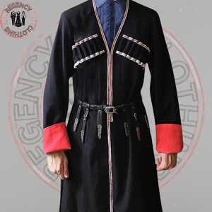 May include: A black coat with red accents on the cuffs and trim. The coat features decorative pockets and a belt. The coat is part of the Regency Clothing collection.