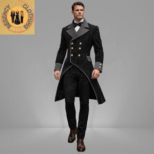 May include: A black double-breasted frock coat with gold buttons, grey lapels, and cuffs. The coat has a tailored fit and is worn with black trousers and a bow tie. The Regency Clothing logo is in the upper left corner.