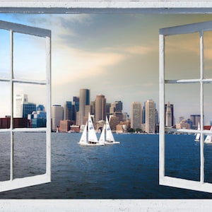 May include: A view of the Boston skyline from a window with sailboats in the water.