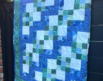 Vintage handmade blue and green cotton quilt