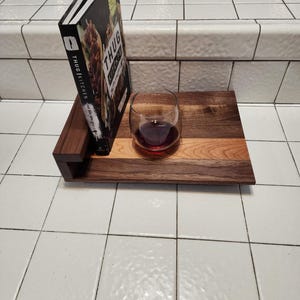 May include: A wooden serving tray with a cookbook titled "Thug Kitchen: Eat Like You Give a Damn" and a glass of red wine. The tray is made of walnut wood and has a natural finish.