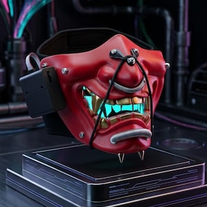 May include: A red samurai-style half-face mask featuring gold-colored teeth, silver-toned metal coil accents, and a black battery pack attached to the side. The mask emits a bright cyan light from the mouth area and includes black straps.