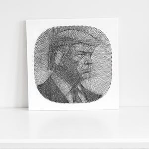 May include: A black and white string art portrait of a person in profile, wearing a suit and tie. The artwork is created with black thread on a white square canvas, showcasing a unique artistic style.