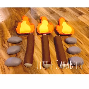 Campfire felt toy separates. Add on logs, stones, marshmellows. camping pretend play, playroom, boys room, girls room outdoor. Felt toys.