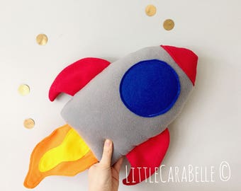 Rocket cushion pillow. Soft anti pill fleece, bright space rocket. Perfect to brighten up any room. Kids room, nursery, space theme