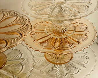 small colorful cake dishes in pressed glass