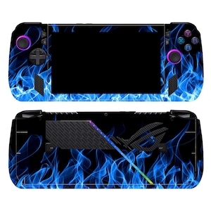 May include: A black handheld gaming console with blue flames and a rainbow-coloured design on the back. The console has two buttons on each side.
