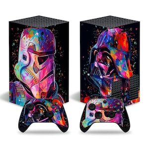May include: Two game consoles and two controllers feature colorful, artistic designs of a Stormtrooper and Darth Vader against a black background. The controllers and consoles have a vibrant, abstract style with a mix of colors.
