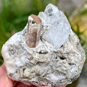 Natural imperial clean Topaz crystal with Quartz on matrix specimen from katlang mine Mardan Raw Topaz specimen.