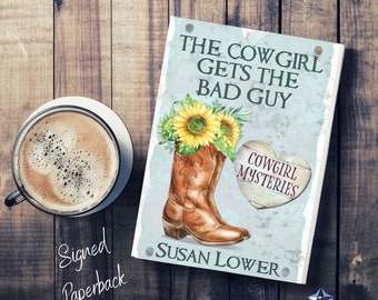 The Cowgirl Gets The Bad Guy signed copy by Susan Lower