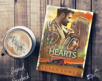 Exemplaire signé Reckless Hearts par Susan Lower