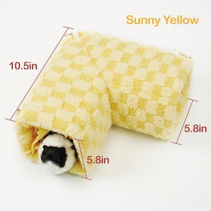 May include: A sunny yellow, checkered pet tunnel, 10.5 inches long and 5.8 inches wide, with a small pet peeking out. The text "Sunny Yellow" is above the tunnel.