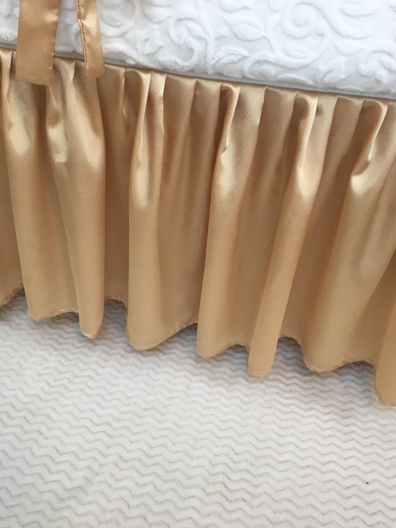 gold crib skirt