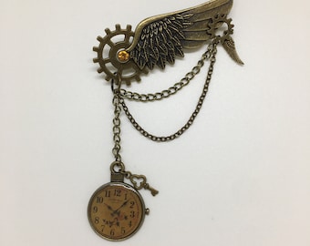 Doesn’t time fly?! Military style Steampunk wing and cog brooch