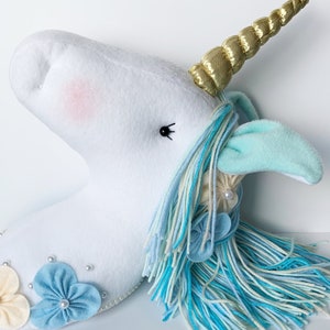 White Fleece Unicorn Head Wall Decor: Felt Flower Details
