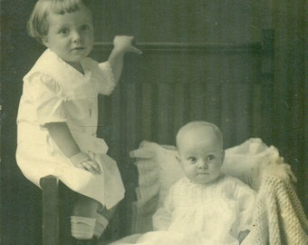 Curious Baby Watching From Chair Big Brother Sitting Bench 1910s Antique RPPC Real Photo Postcard