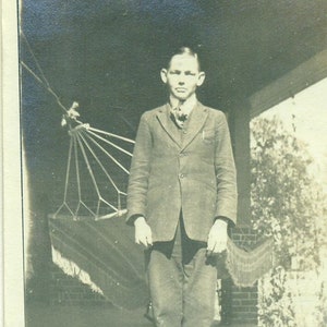Antique Boy Standing on Porch Victorian Hammock Suit Teenage Man Vintage Photograph Black White Sepia Photo