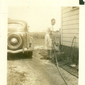 1930s Woman Filling Bucket Water Hose to Wash Car Vintage Photo Sepia Photograph