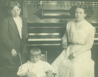 Boys Girl Sitting at Piano Slouching Little Brother Antique RPPC Real Photo Postcard Photograph Black White Photo