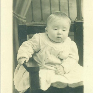 Sleepy Baby Ready for Nap Tim Sitting in Chair 1910s RPPC Real Photo Postcard Photograph Black White Photo