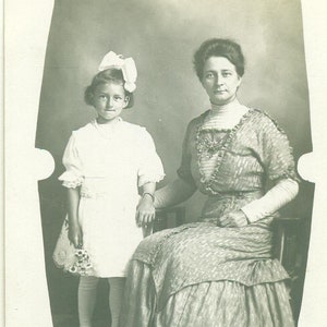 Elegant Woman Holding Daughters Hand Daisy Flower Bouquet RPPC Real Photo Postcard Photograph Black White Photo