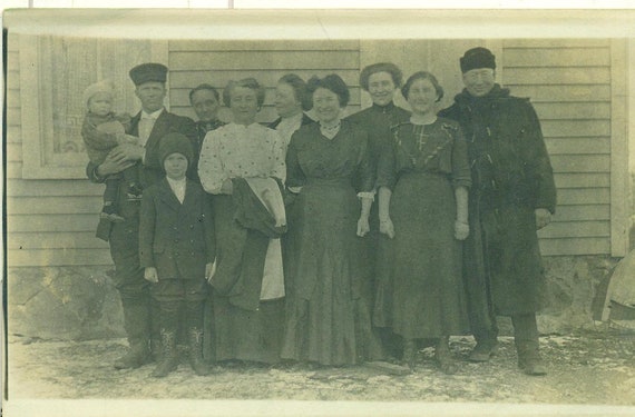 Family Group Standing OUtside Winter Coats Women Looking at Baby  RPPC Real Photo Postcard Photograph Black White Photo