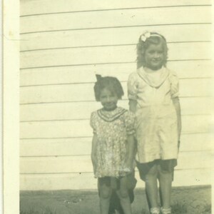 1930s Farm Girls Standing Outside Slightly Rumpled Dress 30s Vintage Photograph Black White Photo