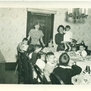 1940s Kids Birthday Party Mothers Holding Baby Inside Dining Room 40s Vintage Photograph Black White Photo
