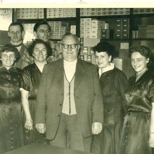 1950s Gas Station Store Empleados Standing Cigarette Cartons Group Photo Black White Photograph