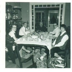 The Unhappy Birthday Frowning Family Cake Dinner Table 1950s Photo Vintage Black White Photograph Picture