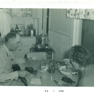 1956 Farmer Wife Eating Kitchen Table Big Bowl Working Man Overalls 50s Vintage Photograph Black White Photo