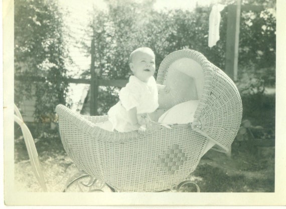 white wicker baby carriage