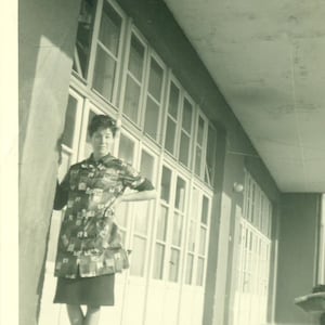 1964 Woman in House Dress Standing Outside Garage 60s Vintage Photograph Black White Photo