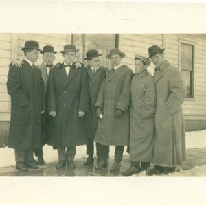 Men Standing Outside in Winter Hands On Shoulders Overcoats Hats Friends 1910s Antique RPPC Real Photo Postcard Photograph Black White Photo