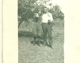 1920s Happy Couple Woman in Knickers Pants Man Holding Camera Flapper RPPC Real Photo Postcard Antique Black White Photo
